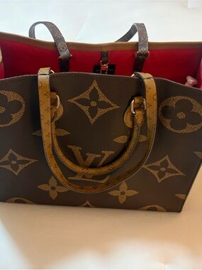 Fashion purse. Monogram Large Tote in Tan/Brown with Red Interior